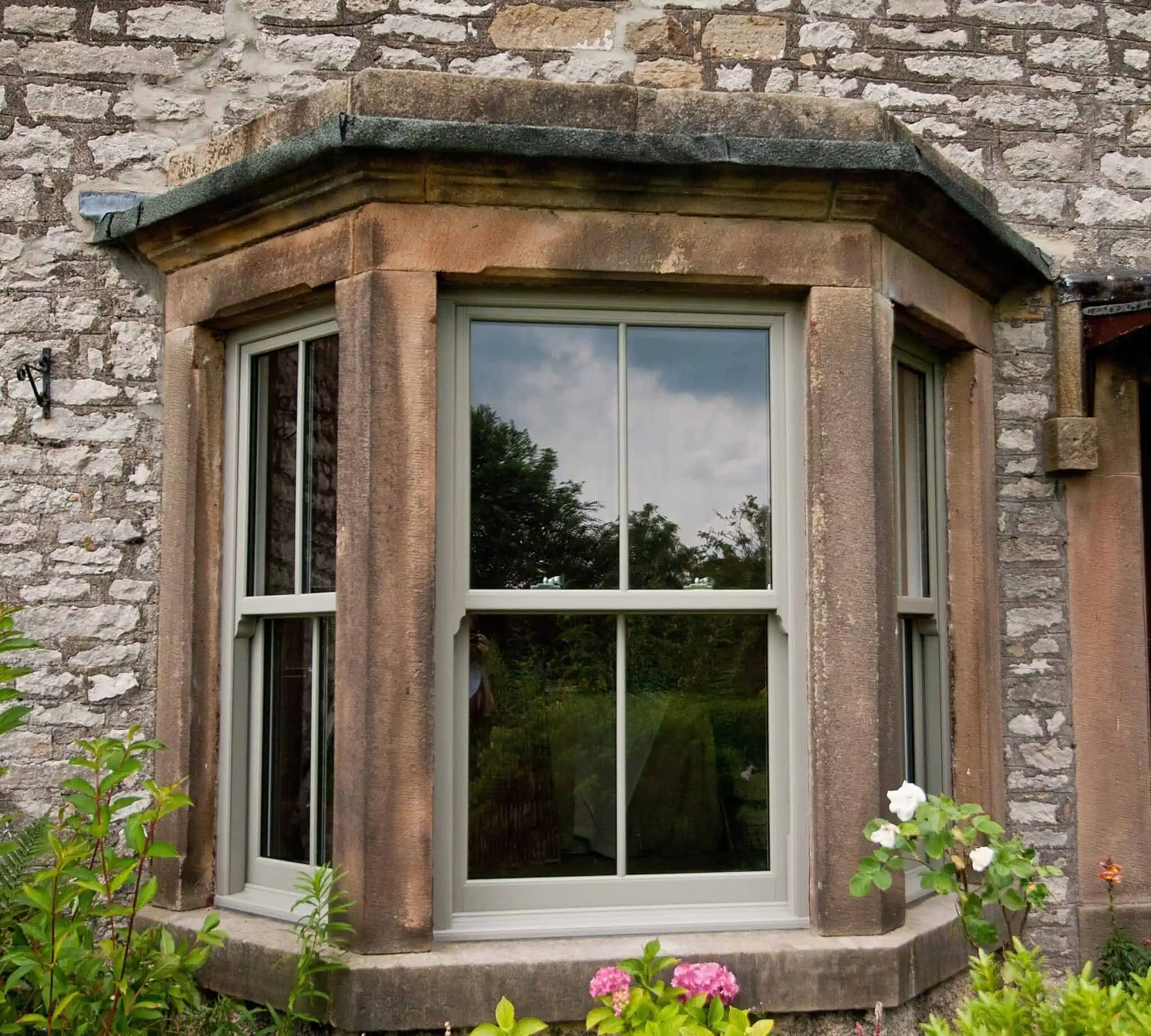 stone bay sash window